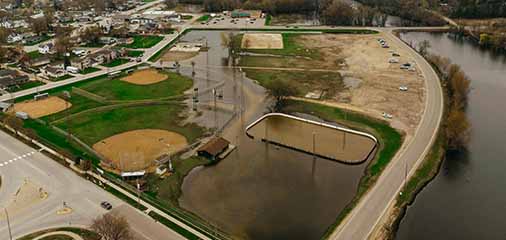 Flooded park by the river - keatsagency.com