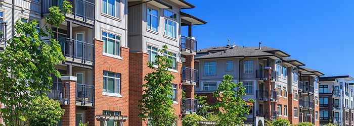 Modern multi-story apartment buildings with balconies - keatsagency.com
